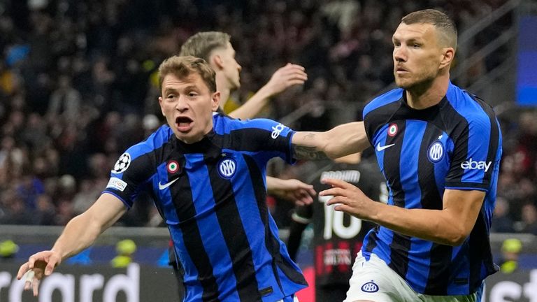 Edin Dzeko of Inter Milan, right, celebrates after scoring his team's first goal during the Champions League semi-final first leg match between AC Milan and Inter Milan at the San Siro stadium in Milan , Italy, on Wednesday, May 10.  January 10, 2023. (AP Photo/Antonio Calanni)