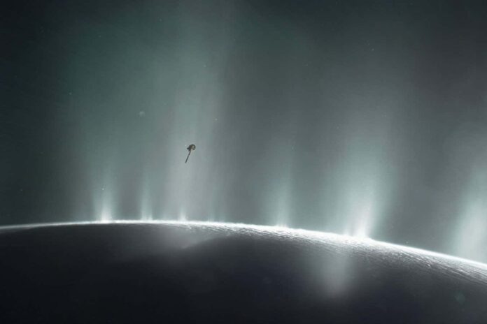 This illustration shows NASA's Cassini spacecraft diving through the plume of Saturn's moon Enceladus, in 2015