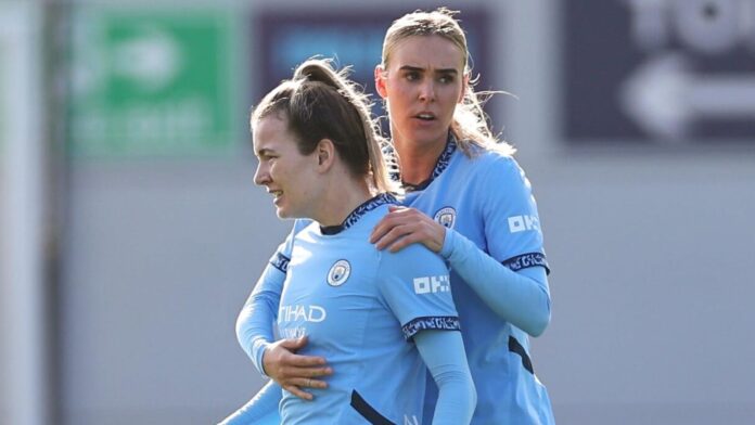 Lauren Hemp is congratulated after equalising for Man City against Aston Villa